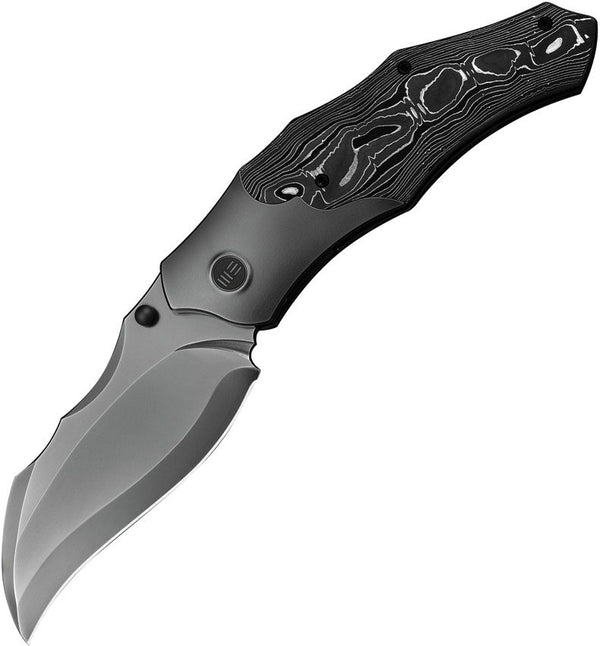 We Knife Co Ltd Orc Boss Nested Linerlock Polished Gray, Black, White Titanium w Aluminum Foil Carbon Fiber Inlay Polished Gray Hawkbill CPM 20CV