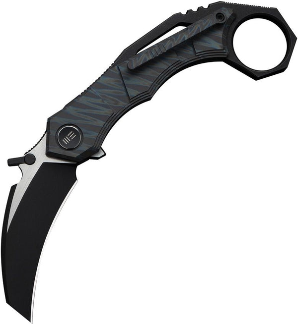 We Knife Co Ltd Tayra Framelock Tiger Stripe Pattern Flamed 6AL4V Titanium Black Stonewashed Satin Flat Hawkbill Bohler M390