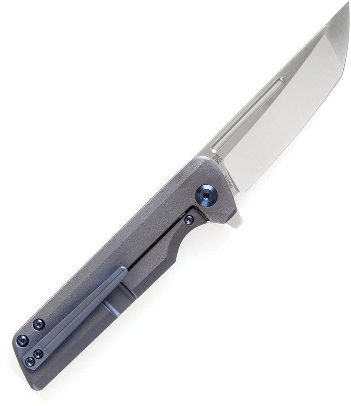 Kansept Knives Anomaly Framelock Blue Orange Peel Titanium Satin Tanto S35VN - Knives.mx