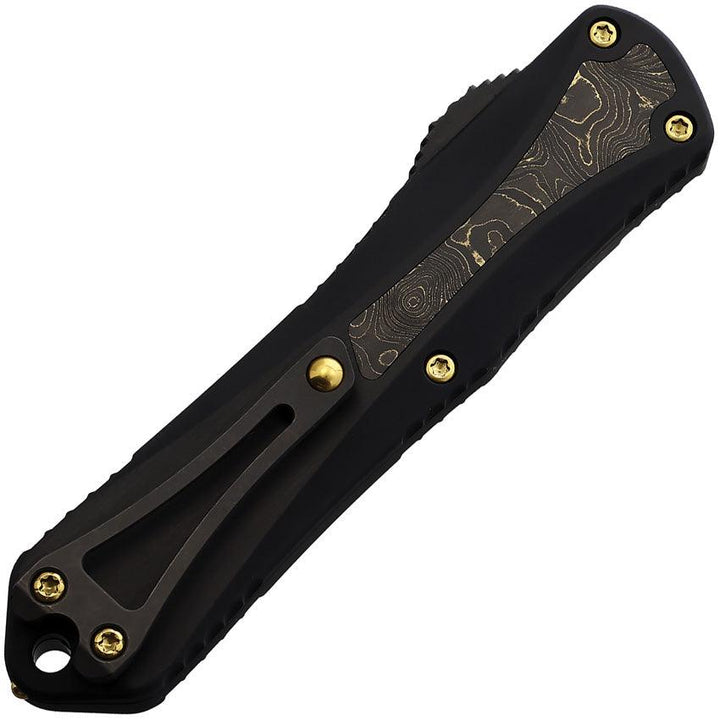 Heretic Knives Auto Manticore OTF BlackAnodized Aluminum w Gold TiNi CF Black CPM MagnaCut - Knives.mx