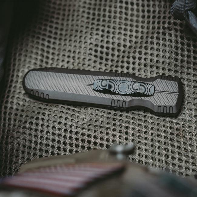 SOG Auto Pentagon OTF Flat Dark Earth Aluminum TiNi Coated CRYO Spear Point S35VN - Knives.mx