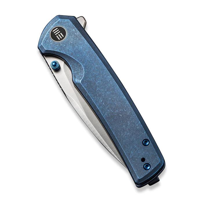 We Knife Subjugator Framelock Blue 6AL4V Titanium Satin CPM 20CV - Knives.mx