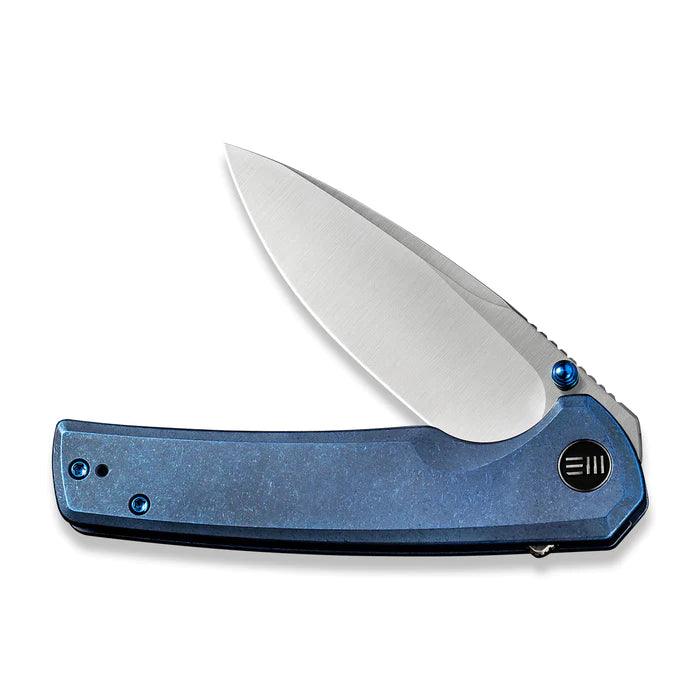 We Knife Subjugator Framelock Blue 6AL4V Titanium Satin CPM 20CV - Knives.mx