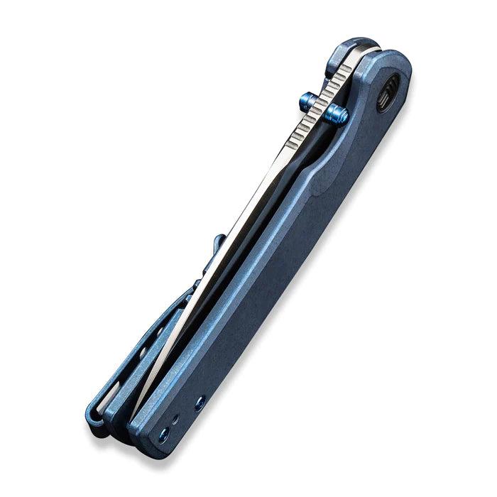 We Knife Subjugator Framelock Blue 6AL4V Titanium Satin CPM 20CV - Knives.mx