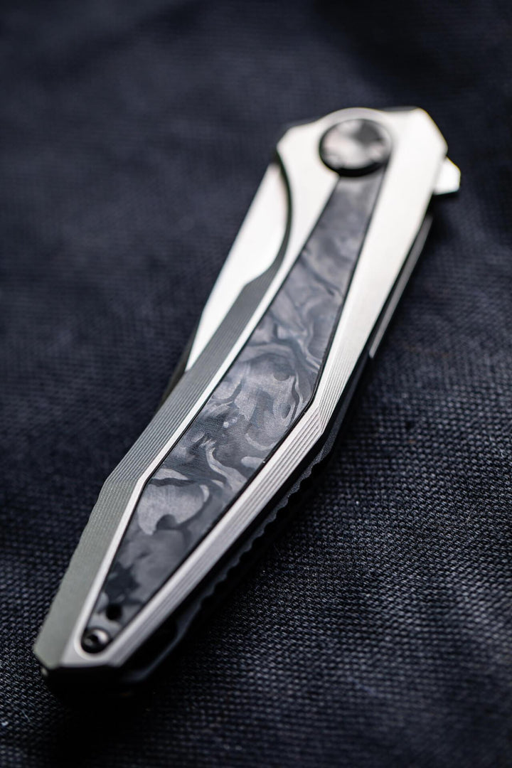 Zero Tolerance Framelock Titanium w Marbled CF SW CPM-20CV - Knives.mx